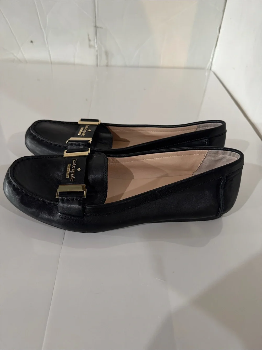 kate spade Black Leather Loafers with Gold Buckle Accents